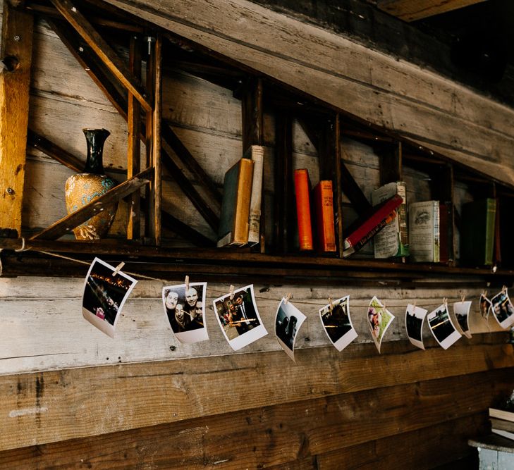 Polaroid Pictures Wedding Decor | Quirky Pub Wedding at The Bell in Ticehurst East Sussex | Epic Love Story Photography