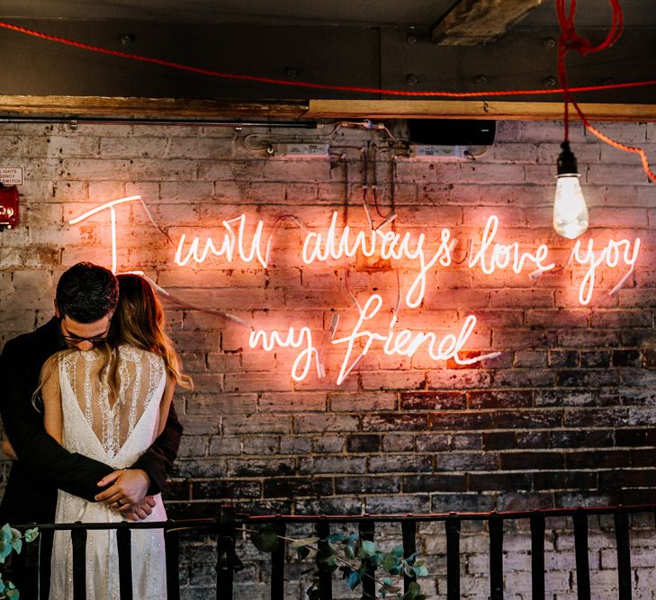 Neon Light Sign | Bride in Charlie Brear Delancey Gown &amp; Belt | Groom in Hugo Boss Suit | Quirky Pub Wedding at The Bell in Ticehurst East Sussex | Epic Love Story Photography