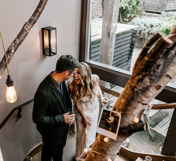 Neon Light Sign | Bride in Charlie Brear Delancey Gown &amp; Belt | Groom in Hugo Boss Suit | Quirky Pub Wedding at The Bell in Ticehurst East Sussex | Epic Love Story Photography