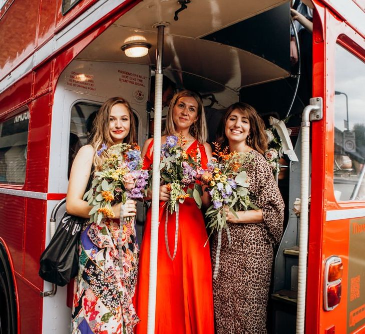 Mismatched Bridesmaid Dresses with Bridal Party on Wedding Transport Bus