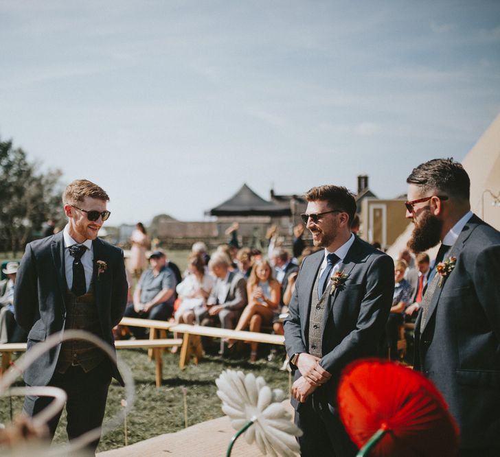 Groom and guests waiting