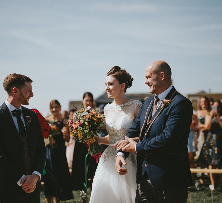 Bride, groom and father of the bride