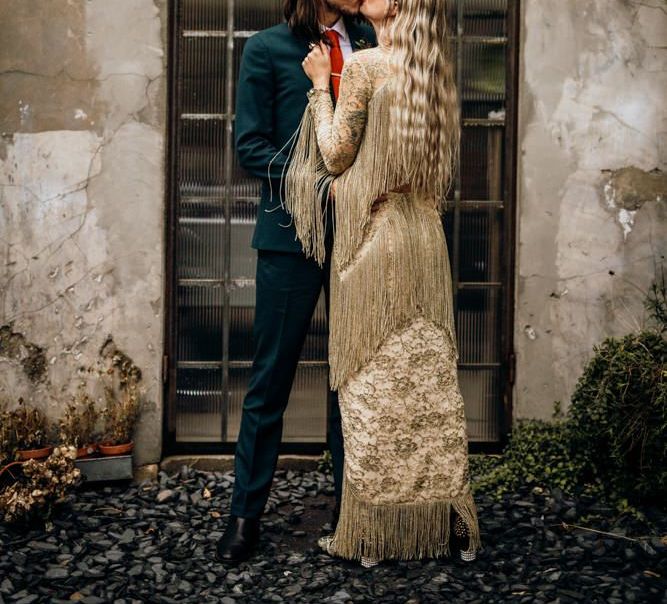 Bride and Groom Embrace Kiss