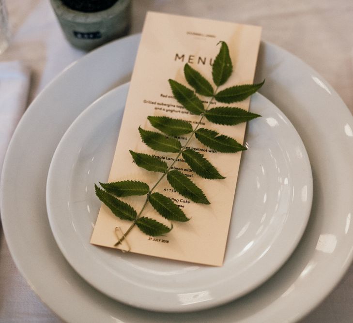 Table Place Setting at Wedding With Foliage