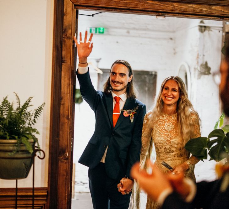 Bride and Groom Entering Ceremony Room