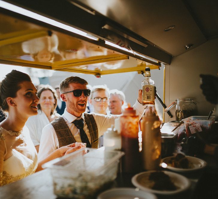 Bride and groom at food truck