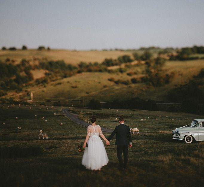 Bride and groom with vintage chevy truck