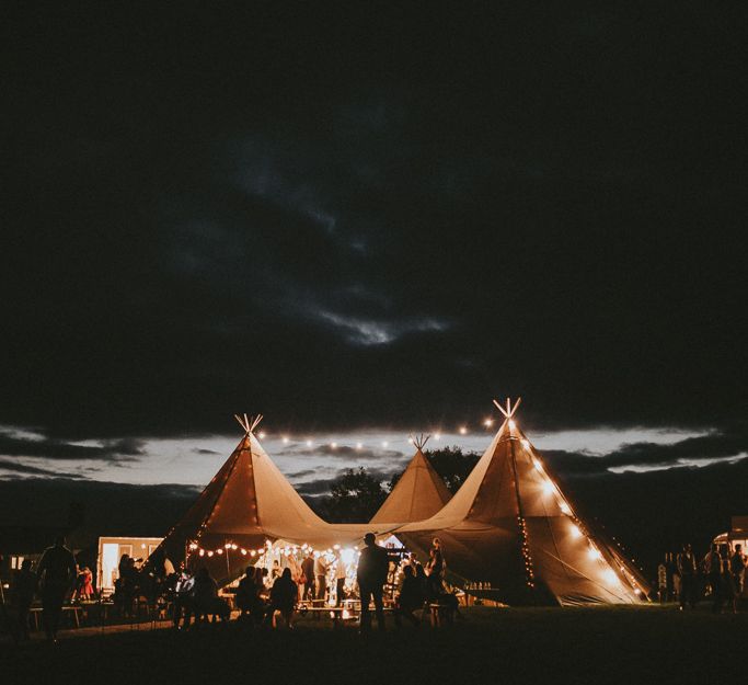 Tipis at night