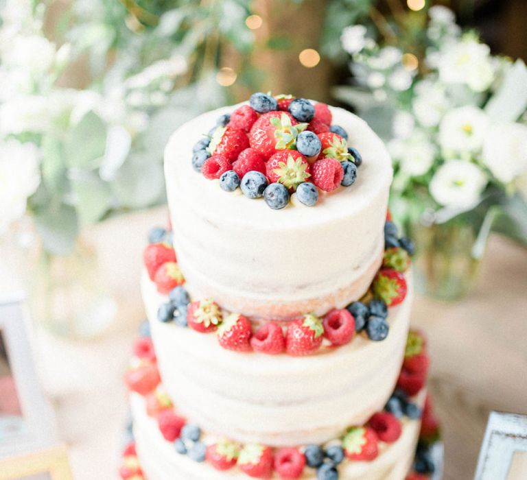 Wedding Cake with Buttercream Icing and Berry Fruit Decor