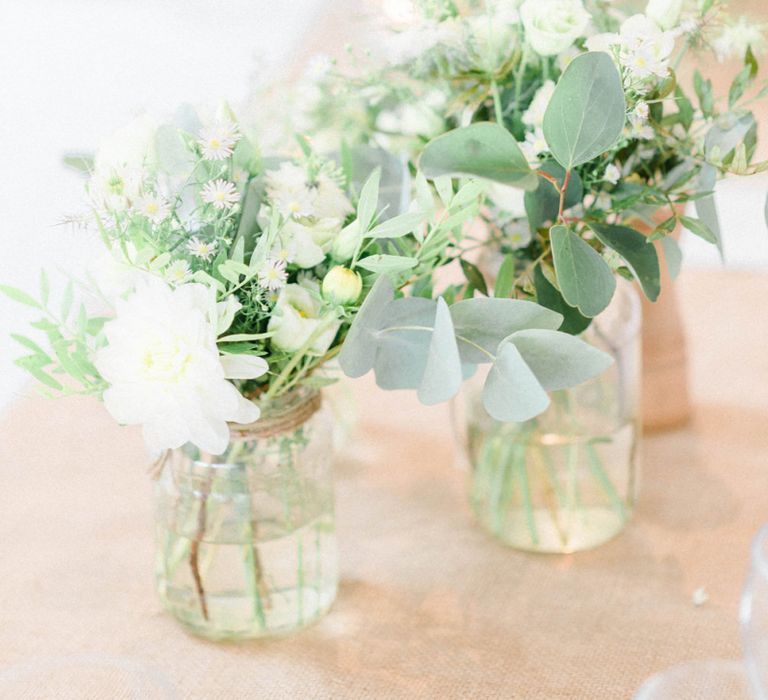 White and Green Wedding Flowers in Bottles