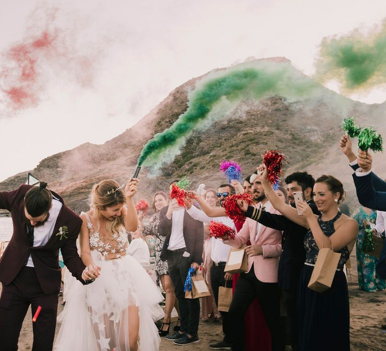 Spanish Beach wedding with smoke bombs