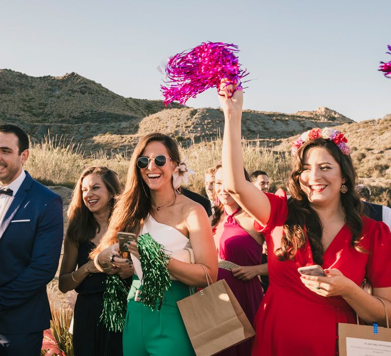 Guests at a Spanish beach wedding