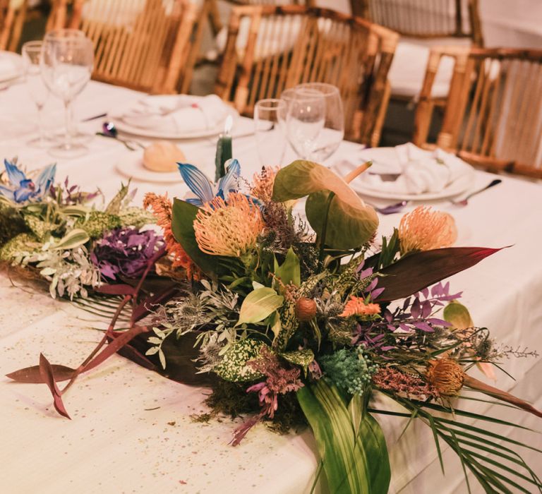 Tables with bright flowers