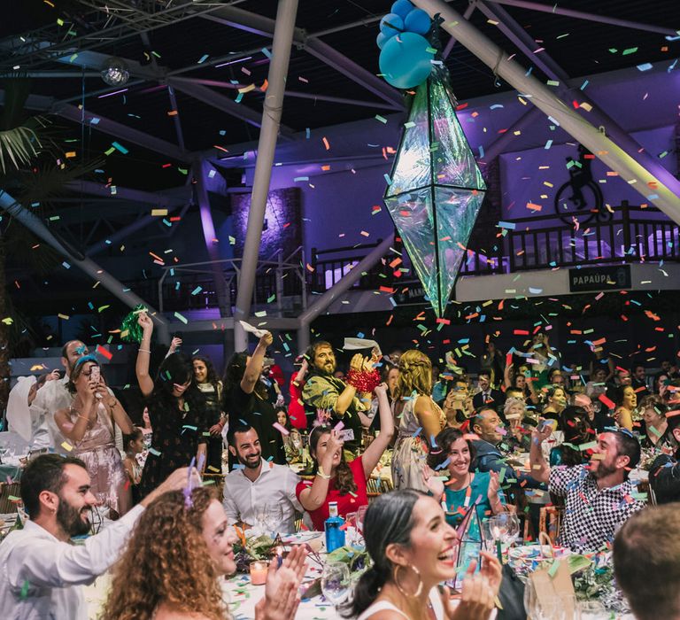 Party atmosphere and festival vibes bride and groom