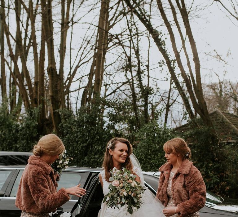 Bride with bridesmaids in cover-ups