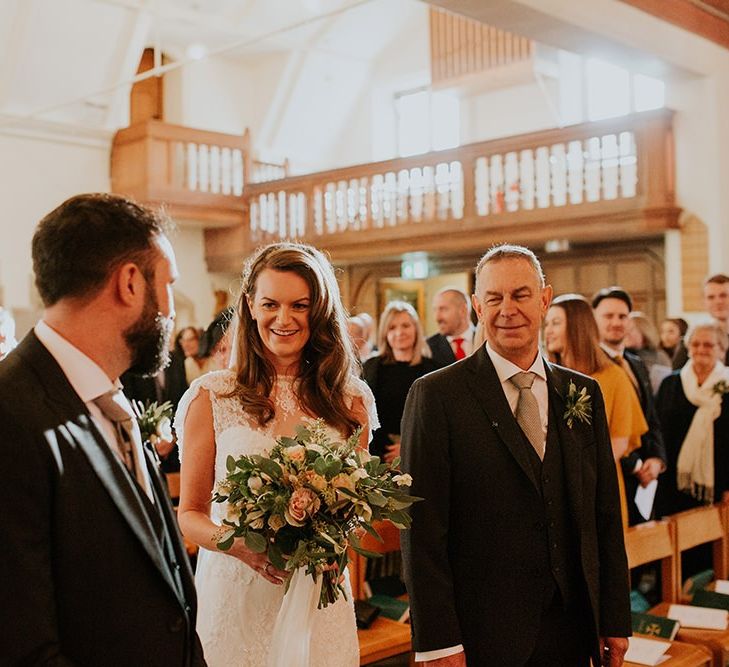 Bride and groom at church ceremony