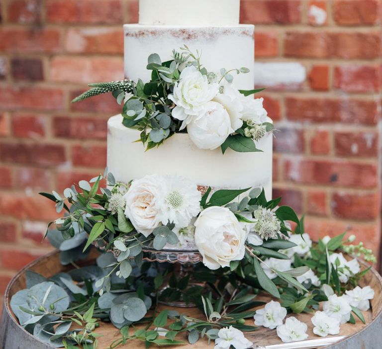 White Blooms and Green Foliage | Cake | French Rustic at Northbrook Park in Surrey | Images by Charlotte Bryer-Ash