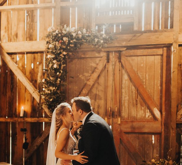 Bride and groom first kiss at Nancarrow Farm ceremony