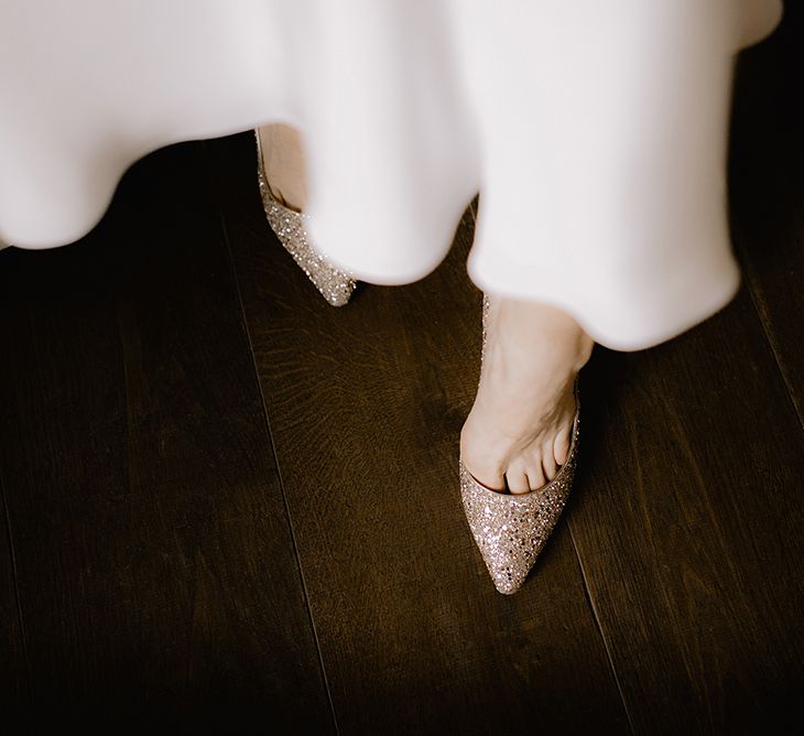 Bride in Sparkly Gold Jimmy Choo Court Shoes | Emerald Green Bridesmaid Dress for a Winter Wedding at Middleton Lodge | Georgina Harrison Photography