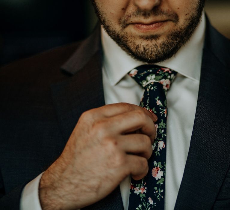 Groom in Navy Suit and Floral Tie | Rifle Paper Co. Trainers for Informal Wedding in Fort Worth, Texas | Paul &amp; Nanda Photography