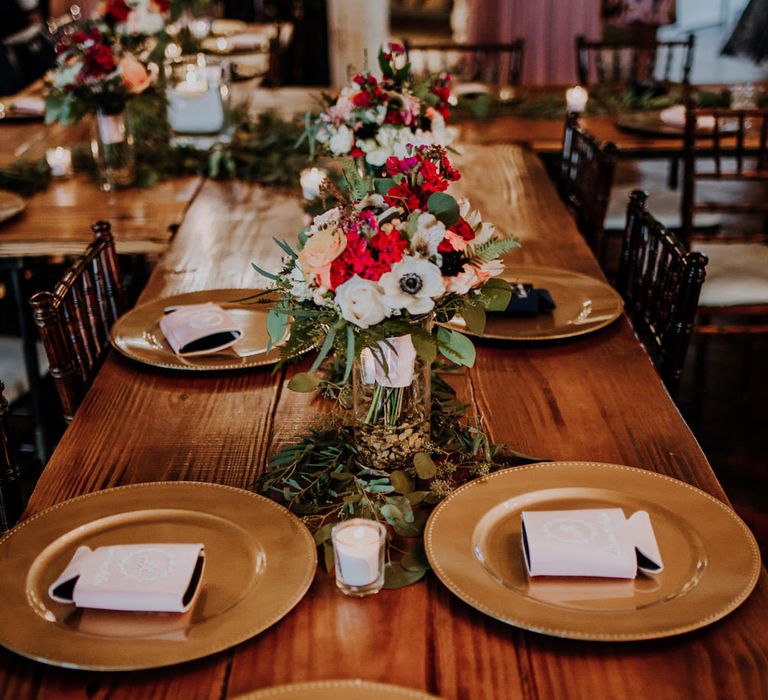 Wedding Reception Décor | Pinwheel Table Configuration | Gold Charger Plates | Eucalyptus Garlands | Koozie Wedding Favours | Colourful Bouquet of Pink, Orange and White Flowers with Ferns, Eucalyptus and Greenery | Candles | Rifle Paper Co. Trainers for Informal Wedding in Fort Worth, Texas | Paul &amp; Nanda Photography