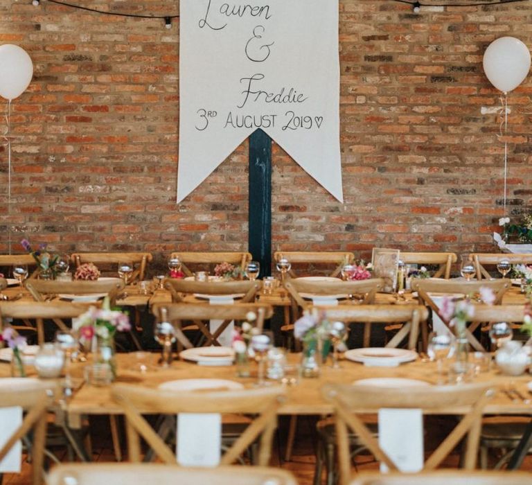 DIY wedding decor with personalised banner and wedding balloons