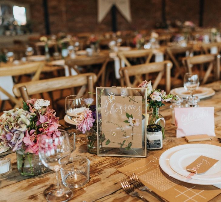 Beautiful rustic wedding setting with pastel flowers