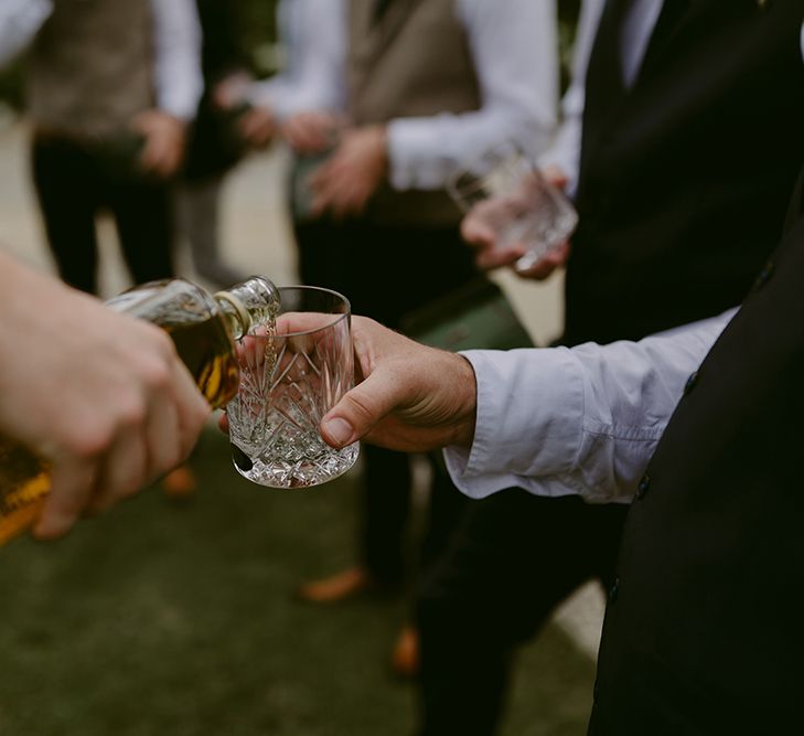 Whiskey Glass | Outdoor Boho Wedding at Chateau le Tour, France | Adam and Grace Photography | Head and Heart Films