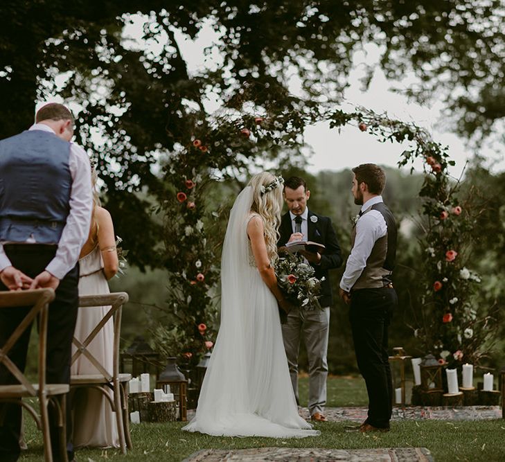 Wedding Ceremony | Floral Arch | Outdoor Boho Wedding at Chateau le Tour, France | Adam and Grace Photography | Head and Heart Films