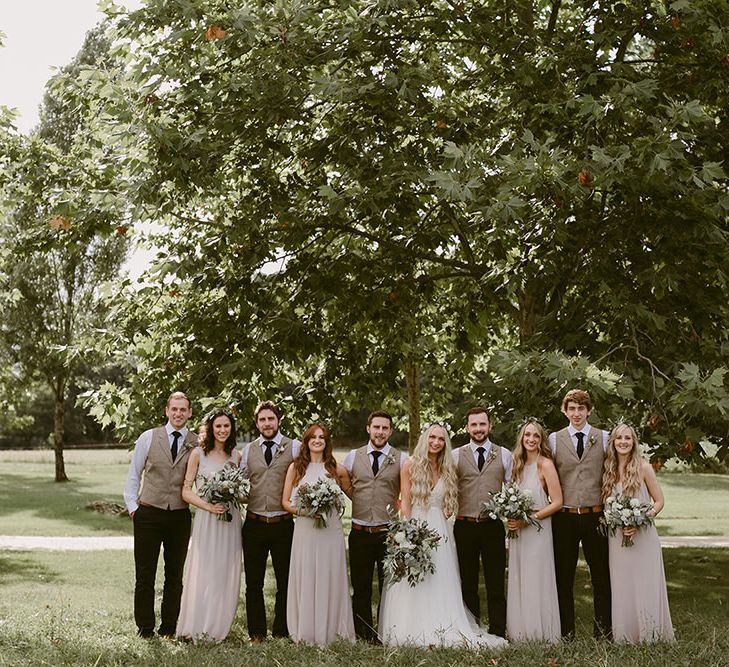 Wedding Party | Bride in Daalarna Bridal Gown | Bridesmaids in Show Me Your Mumu Dresses | Groomsmen in Waistcoats | Outdoor Boho Wedding at Chateau le Tour, France | Adam and Grace Photography | Head and Heart Films