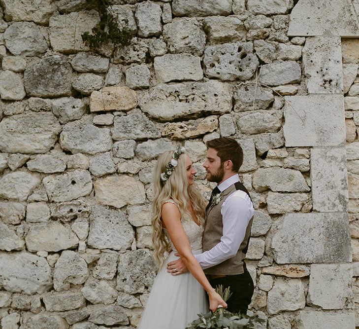 Bride in Daalarna Bridal Gown | Groom in Waistcoat | Festoon Lit Outdoor Boho Wedding at Chateau le Tour, France | Adam and Grace Photography | Head and Heart Films