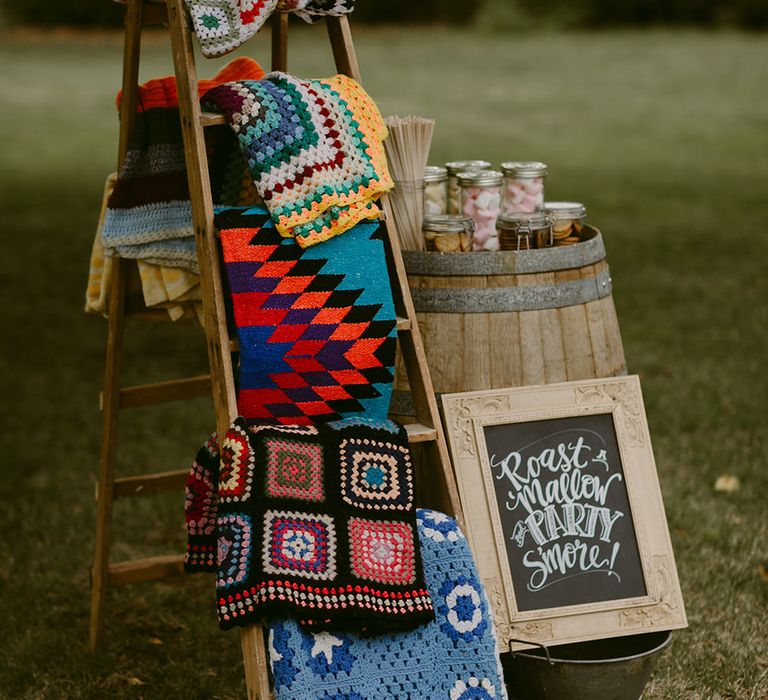 Smore's and Blankets | Trestle Tablescape | Festoon Lit Outdoor Boho Wedding at Chateau le Tour, France | Adam and Grace Photography | Head and Heart Films