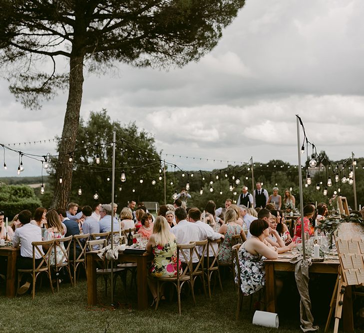 Festoon Lit Outdoor Boho Wedding at Chateau le Tour, France | Adam and Grace Photography | Head and Heart Films