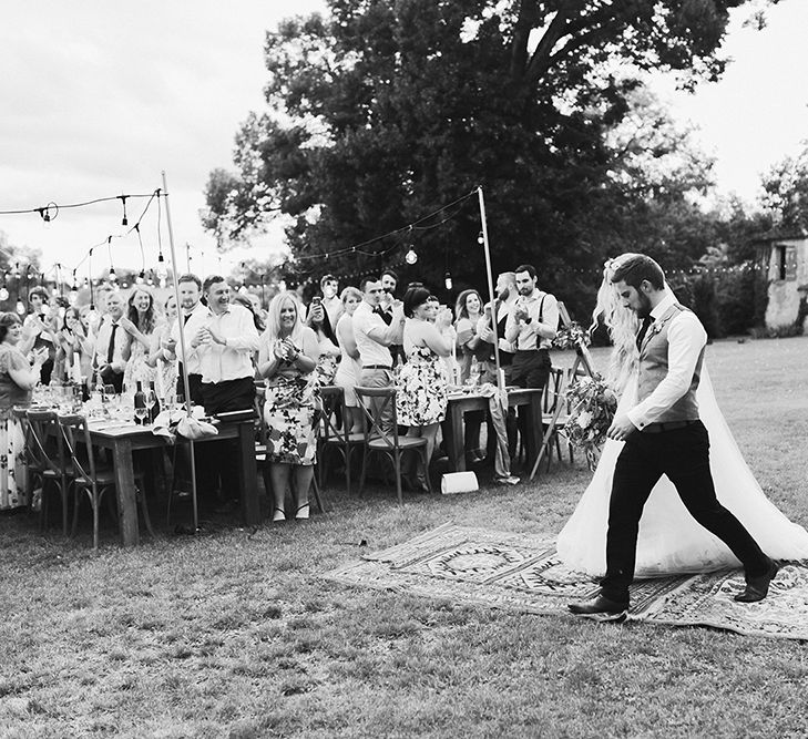 Bride in Daalarna Bridal Gown | Groom in Waistcoat | Festoon Lit Outdoor Boho Wedding at Chateau le Tour, France | Adam and Grace Photography | Head and Heart Films