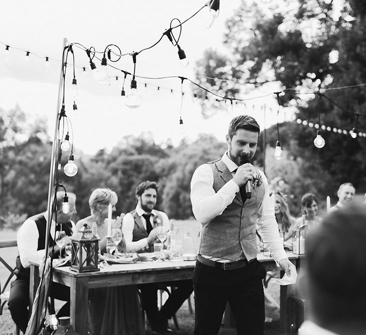 Wedding Speeches | Groom in Waistcoat | Festoon Lit Outdoor Boho Wedding at Chateau le Tour, France | Adam and Grace Photography | Head and Heart Films