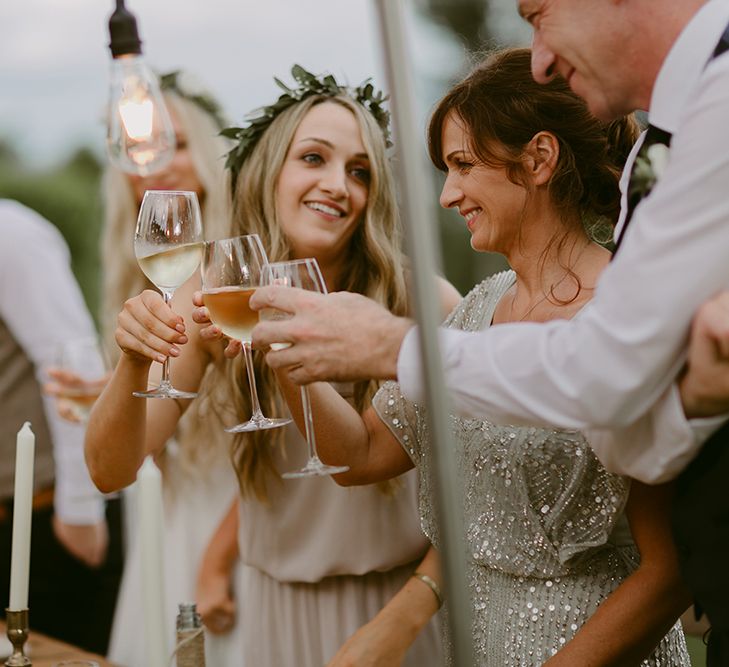 Cheers | Festoon Lit Outdoor Boho Wedding at Chateau le Tour, France | Adam and Grace Photography | Head and Heart Films