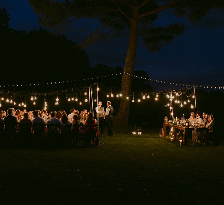 Festoon Lit Outdoor Boho Wedding at Chateau le Tour, France | Adam and Grace Photography | Head and Heart Films