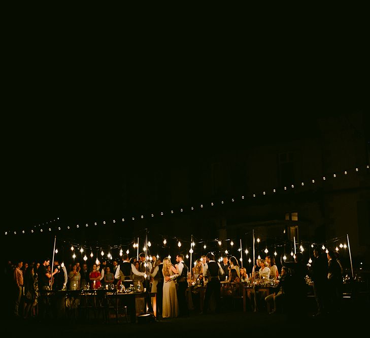 Festoon Lit Outdoor Boho Wedding at Chateau le Tour, France | Adam and Grace Photography | Head and Heart Films