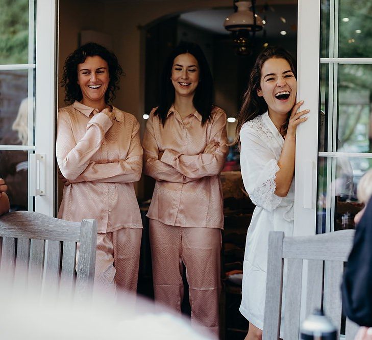 Bridal party preparations for pub wedding with layered wedding dress