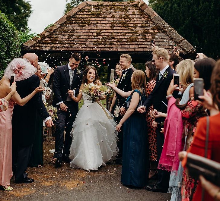 Confetti exit for bride and groom