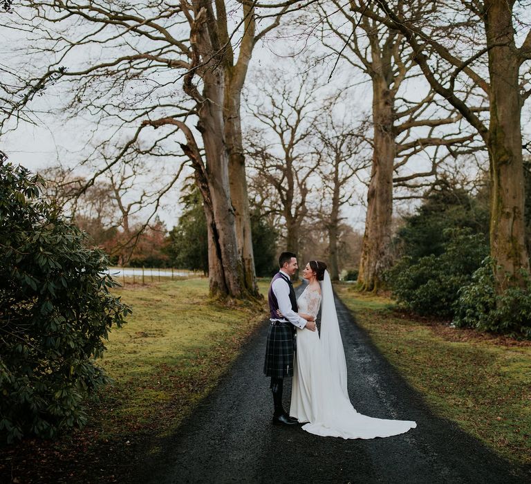 Elegant Scottish Wedding At Kirknewton Stables With Lilac Colour Palette Semi Naked Wedding Cake And Images From Ross Alexander Photography