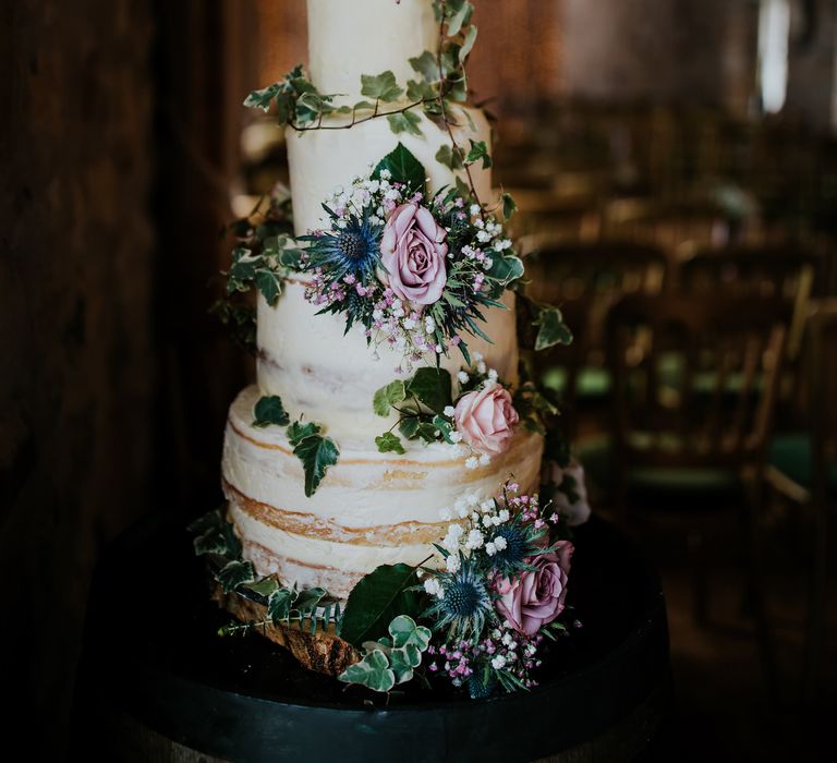 Semi Naked Wedding Cake With Thistles // Elegant Scottish Wedding At Kirknewton Stables With Lilac Colour Palette Semi Naked Wedding Cake And Images From Ross Alexander Photography