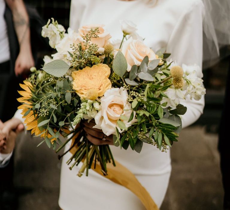 Yellow and green bridal bouquet with sunflower