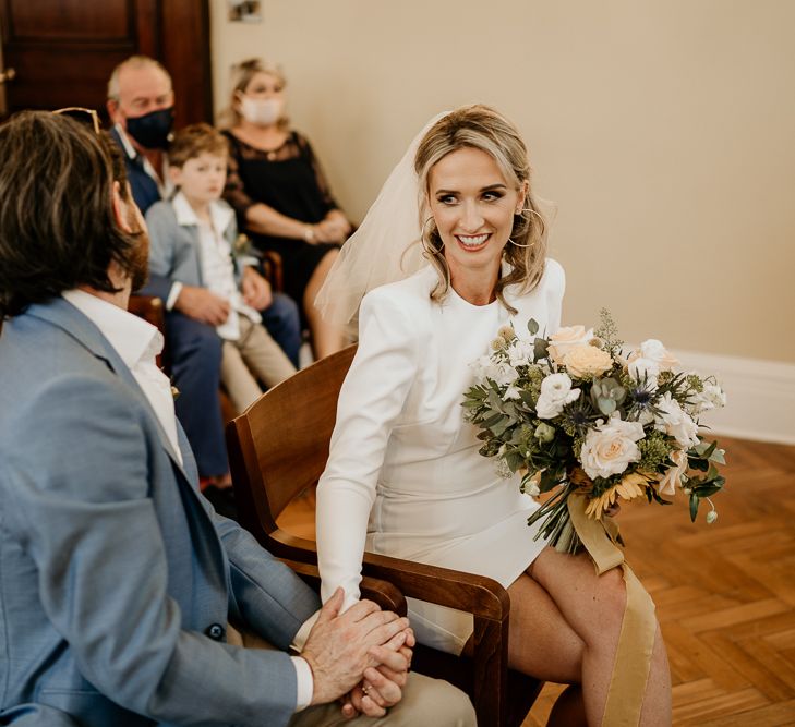 Stylish bride and groom at London city wedding