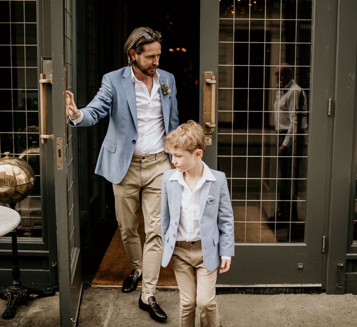 Groom and son in blue blazer and chinos