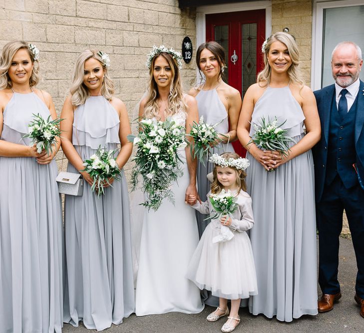 Bridal Party Portrait with Bride in Mikaella Wedding Dress, Bridesmaids in Silver mist TH&amp;TH Dresses and Mother and Father of the Bride