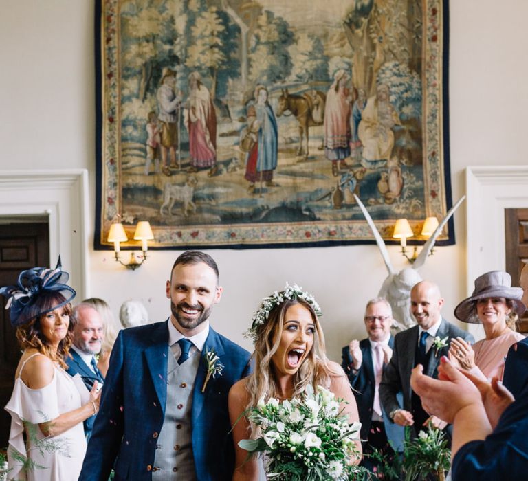 Wedding Ceremony Bride and Groom Exit in Mikaella Wedding Dress and Bespoke Navy Check Suit