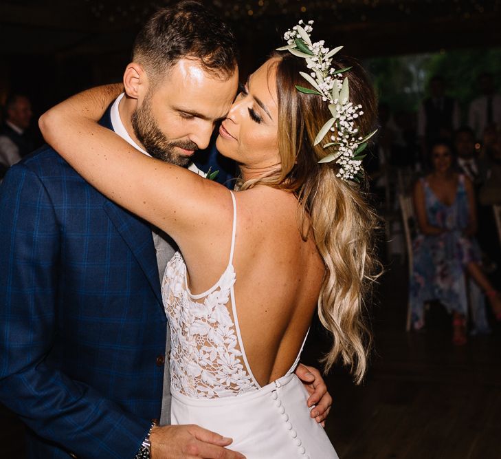 First Dance with Bride in Fitted Mikaella Wedding Dress  and Flower Crown and Groom in Bespoke Navy Check Suit