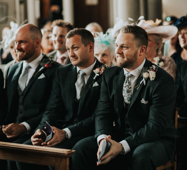 Groom waits for bride in church