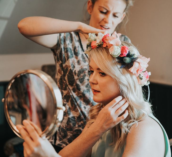 Bright flower crown for bridal party in different bridesmaid dresses